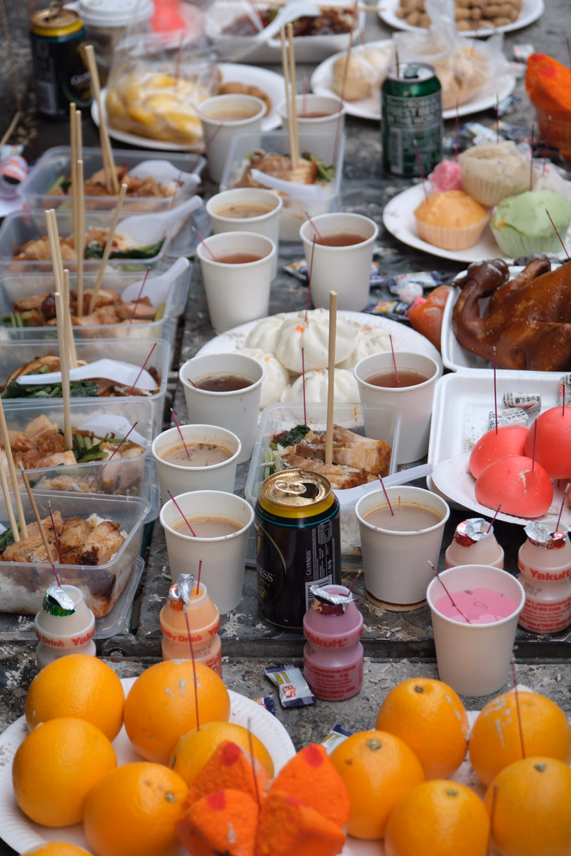 A food-themed photo of a table filled with various food items and drinks.